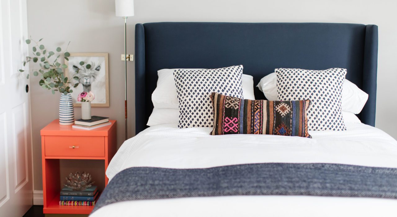A guest bedroom makeover with Brooklinen sheets, making luxury affordable.